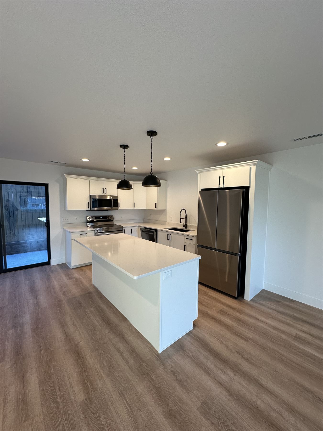 Kitchen with island built by Build It Brothers